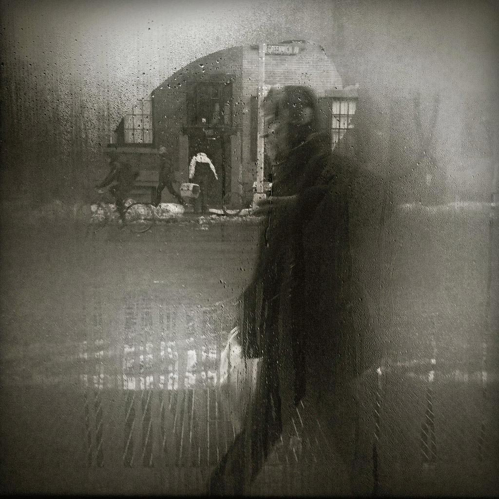 The Man Behind the Foggy Glass