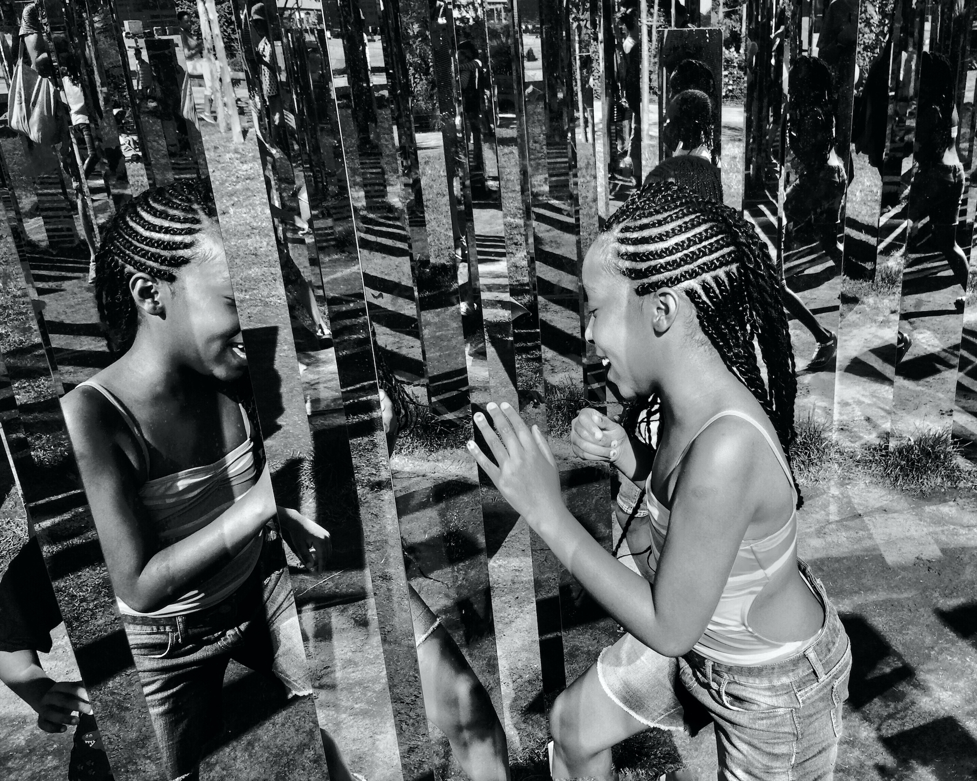 Happiness is a Reflected Smile that Multiplies